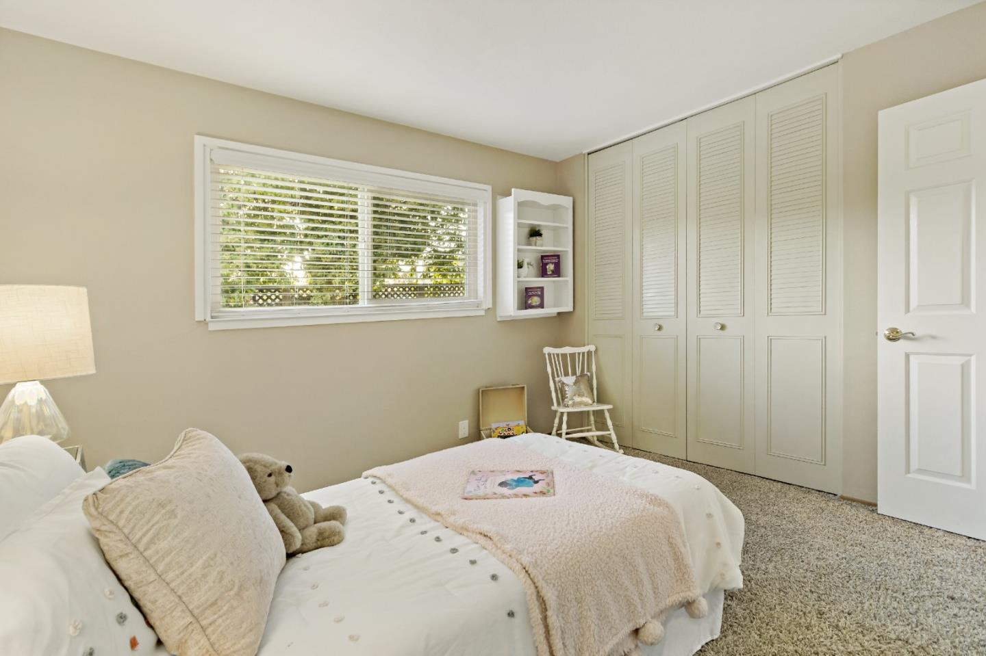 1287 Peralta Drive San Jose, CA 95120 - Photo 37 of 38 a bedroom with a bed and a window