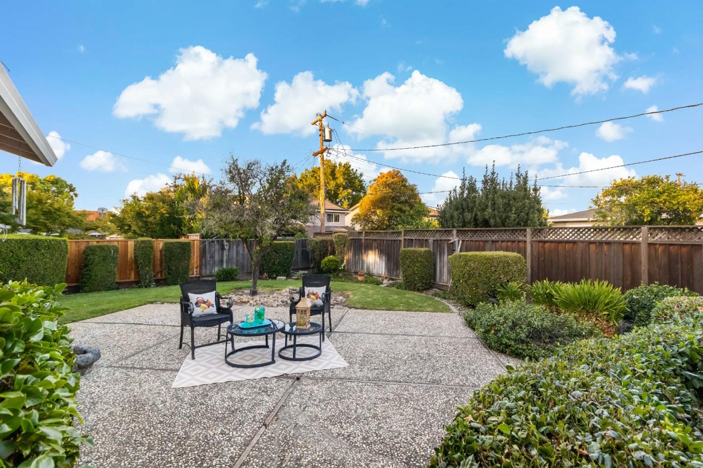 1287 Peralta Drive San Jose, CA 95120 - Photo 5 of 38 a view of a backyard with sitting area and garden