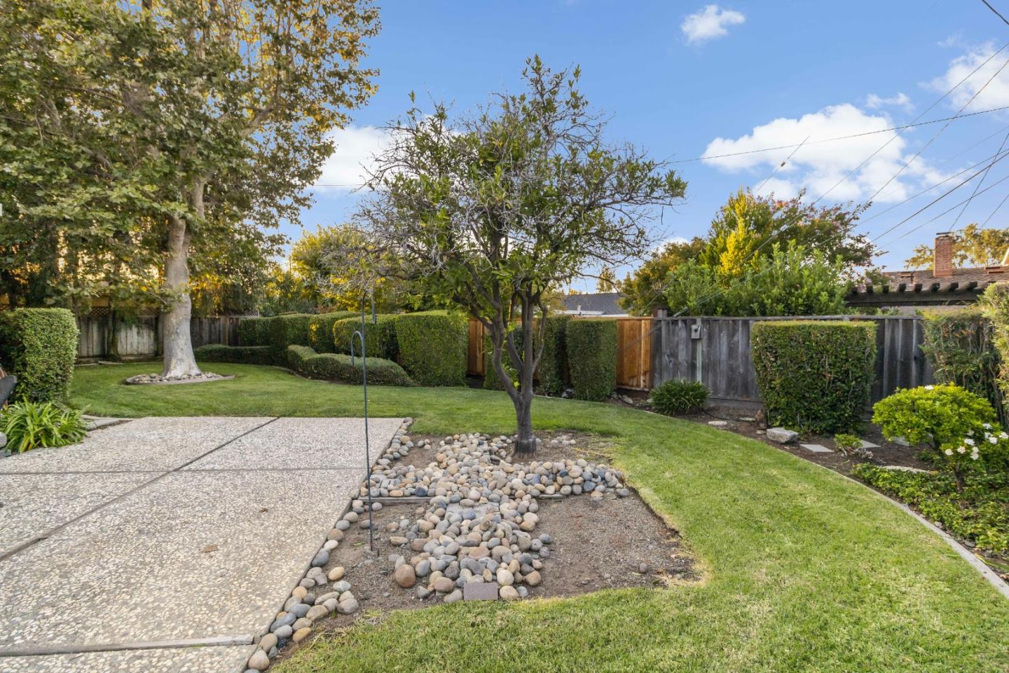 1287 Peralta Drive San Jose, CA 95120 - Photo 7 of 38 a view of a garden with a pathway