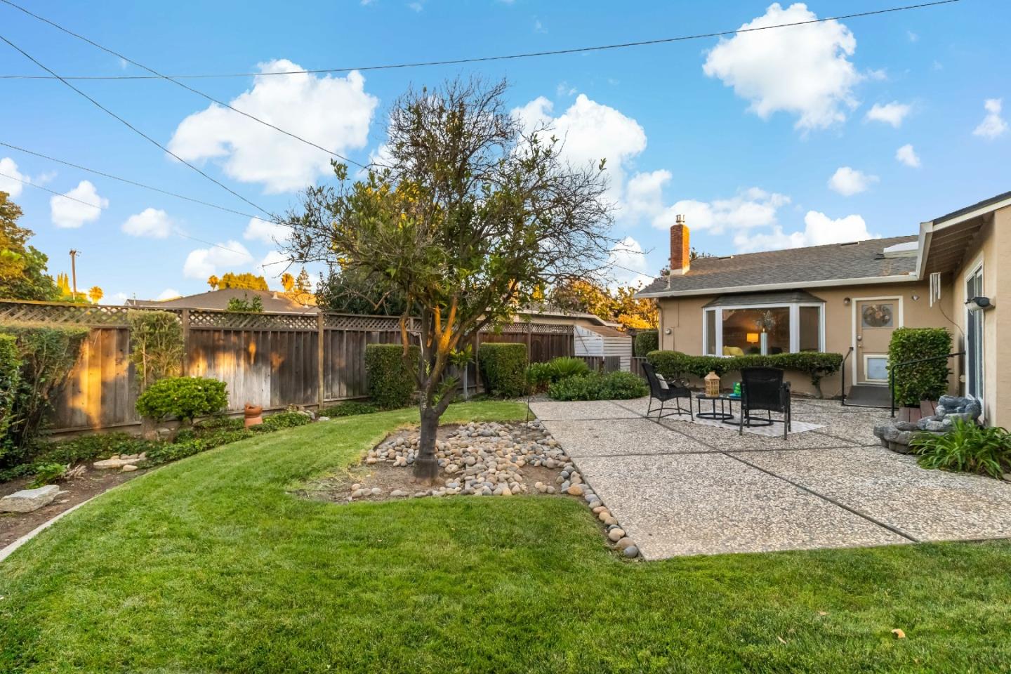 1287 Peralta Drive San Jose, CA 95120 - Photo 8 of 38 a house view with a sitting space and garden
