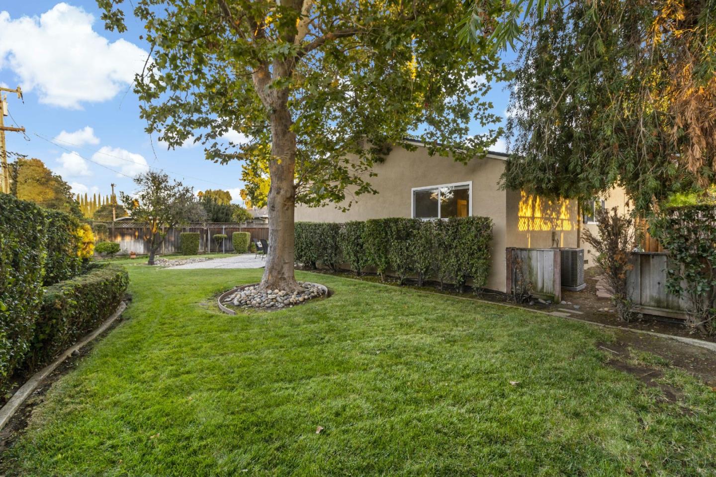 1287 Peralta Drive San Jose, CA 95120 - Photo 9 of 38 a view of a house with a yard