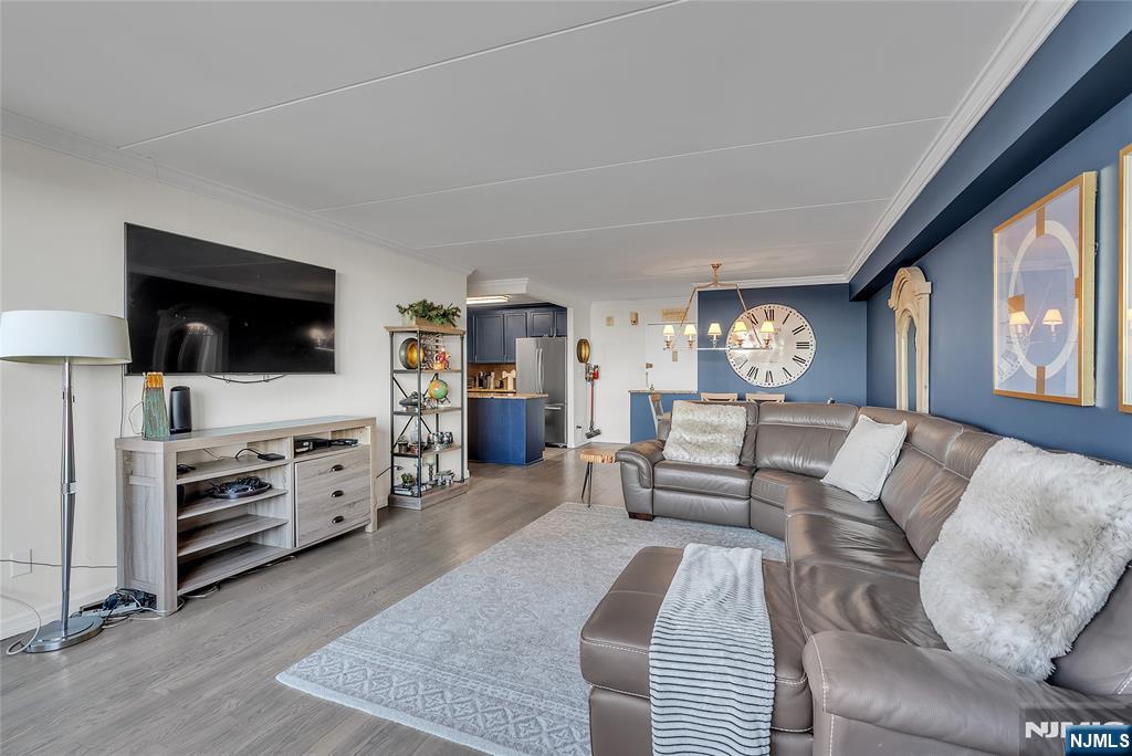 250 Gorge Road, Unit 21B Cliffside Park, NJ 07010 - Photo 3 of 37 a living room with furniture and a flat screen tv