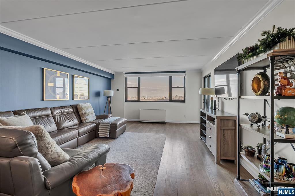 250 Gorge Road, Unit 21B Cliffside Park, NJ 07010 - Photo 5 of 37 a living room with furniture and a window