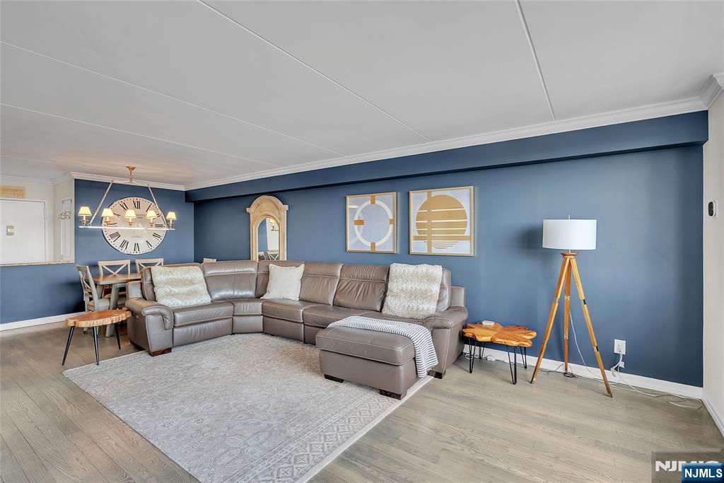 250 Gorge Road, Unit 21B Cliffside Park, NJ 07010 - Photo 10 of 37 a living room with furniture and a wooden floor