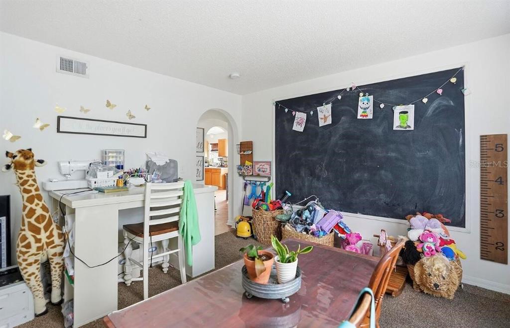 11077 Jenny Wren Road Weeki Wachee, FL 34614 - Photo 18 of 42 a view of a workspace with furniture