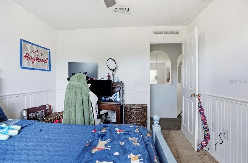 11077 Jenny Wren Road Weeki Wachee, FL 34614 - Photo 23 of 42 a view of a livingroom with furniture and workspace