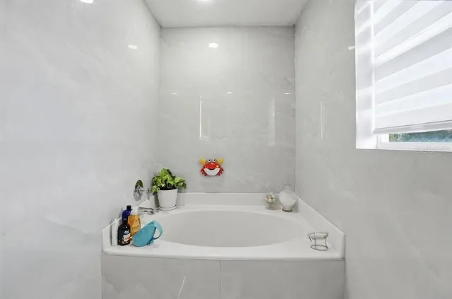 a bathroom with a bathtub