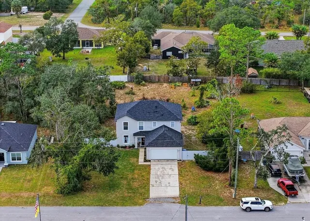 an aerial view of multiple houses