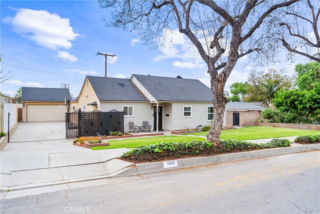 7932 Euclid Avenue Whittier, CA 90602 - Photo 2 of 31 a front view of house with yard and trees