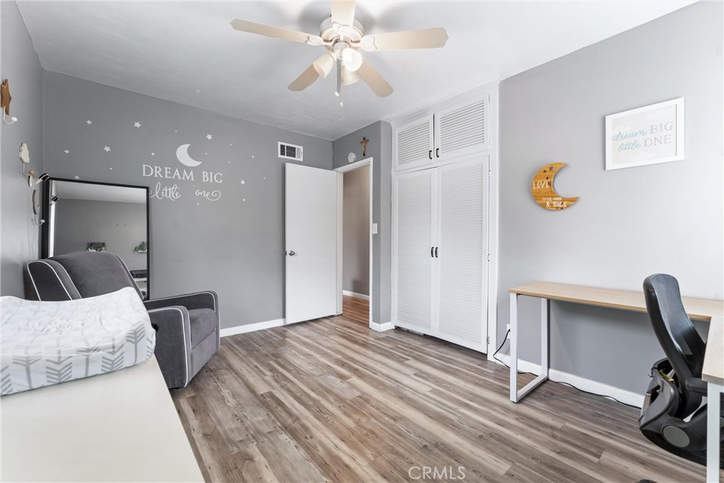 7932 Euclid Avenue Whittier, CA 90602 - Photo 22 of 31 a bedroom with bed and window
