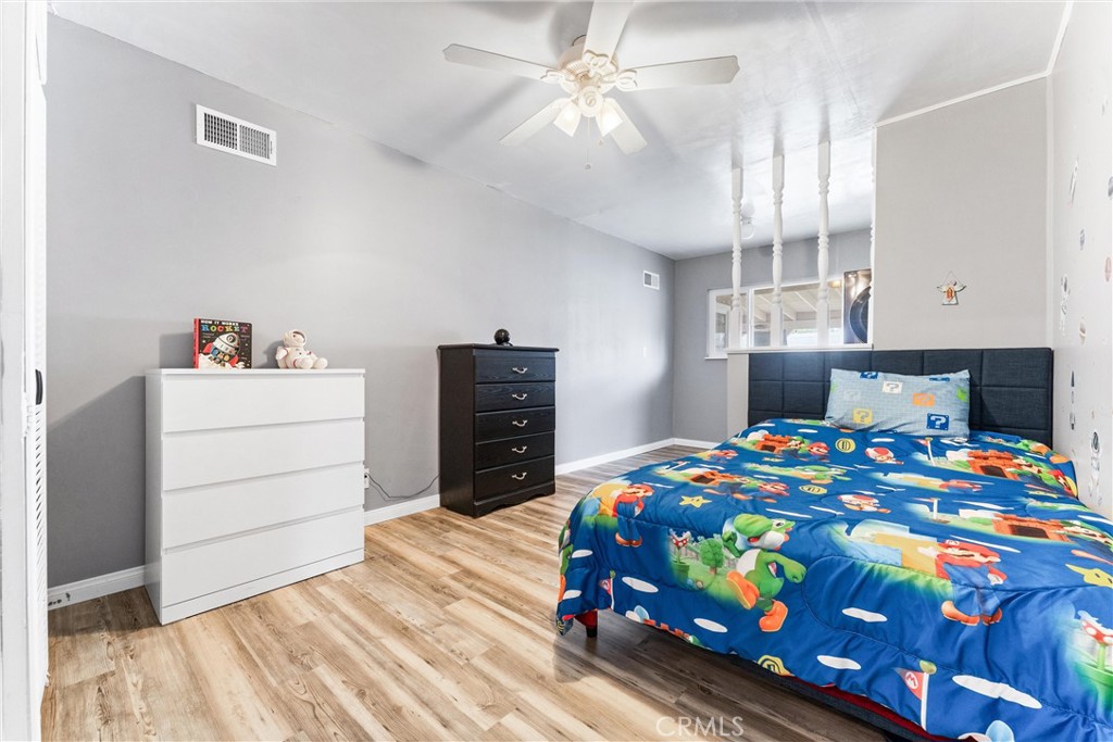 7932 Euclid Avenue Whittier, CA 90602 - Photo 23 of 31 a bedroom with a bed and a dresser