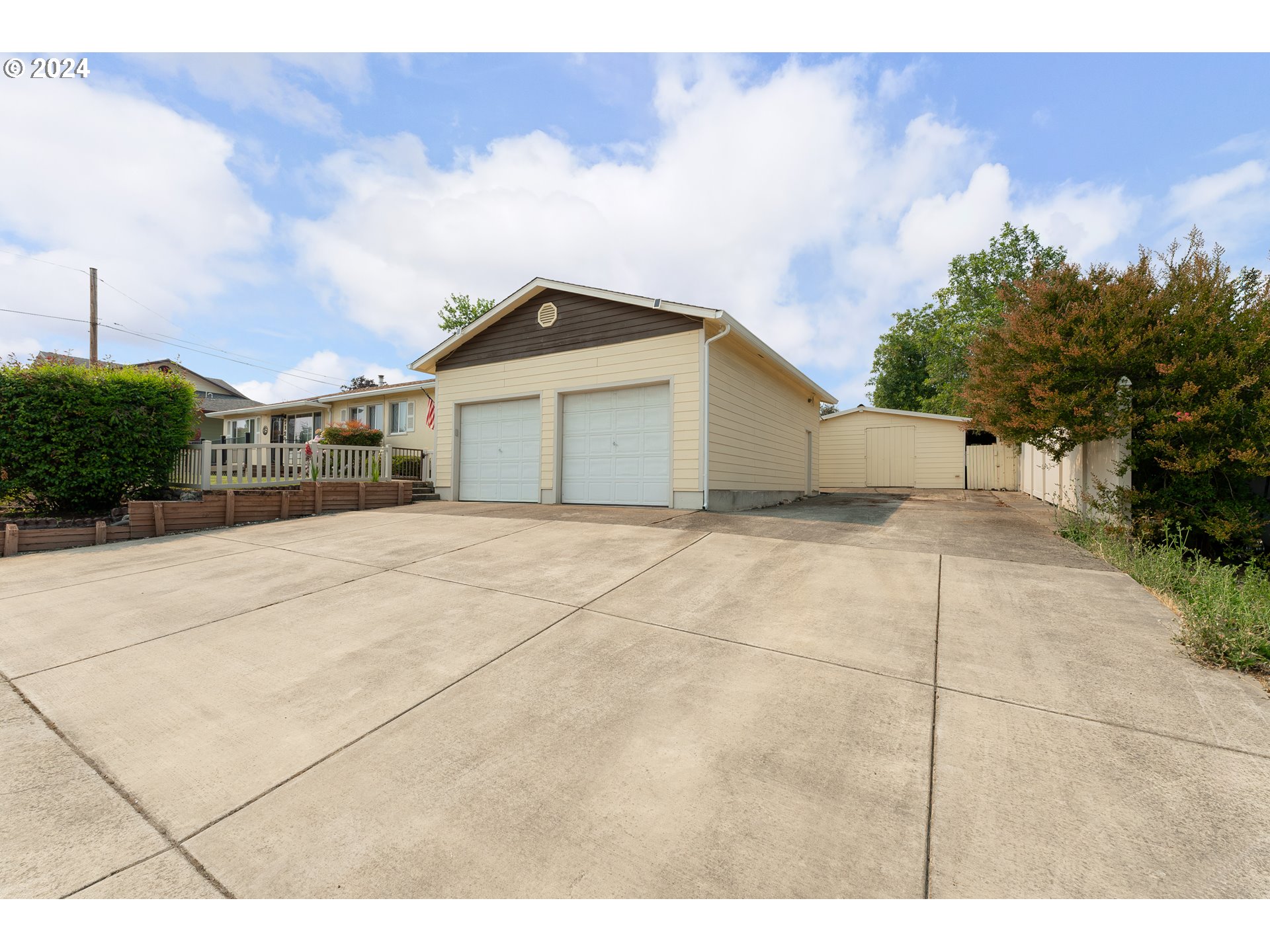 712 4th Avenue Riddle, OR 97469 - Photo 6 of 34 a view of a house with a patio