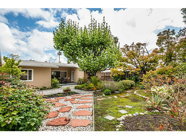 251 Marcella Way Millbrae, CA 94030 - Photo 14 of 14 a backyard of a house with yard and outdoor seating