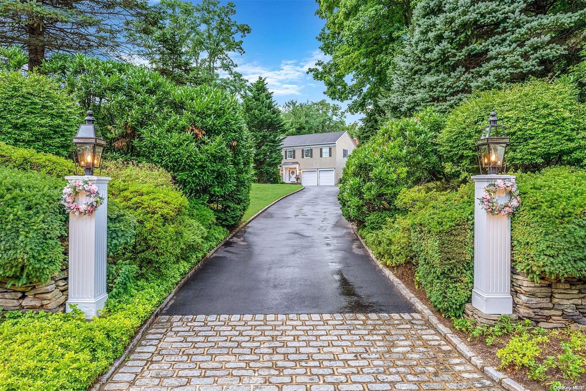 4 Fox Ridge Lane Locust Valley, NY 11560 - Photo 1 of 1 a view of a pathway both side of the yard