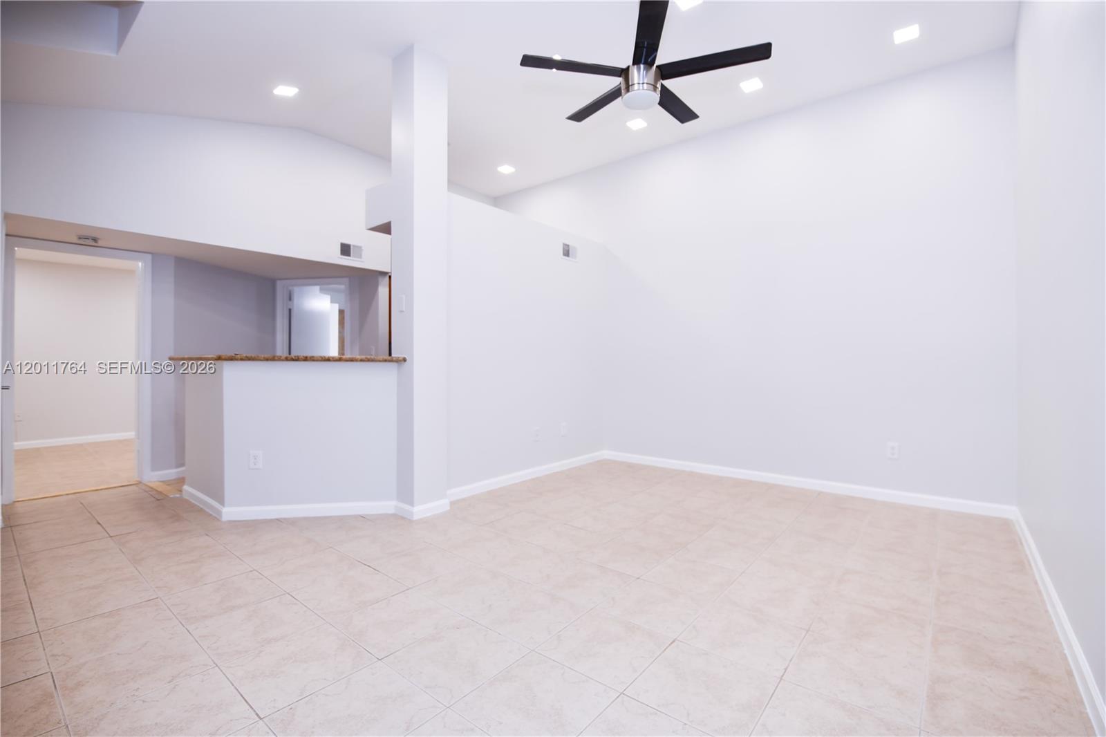 1011 Crystal Way, Unit D Delray Beach, FL 33444 - Photo 2 of 9 a view of a kitchen with a sink