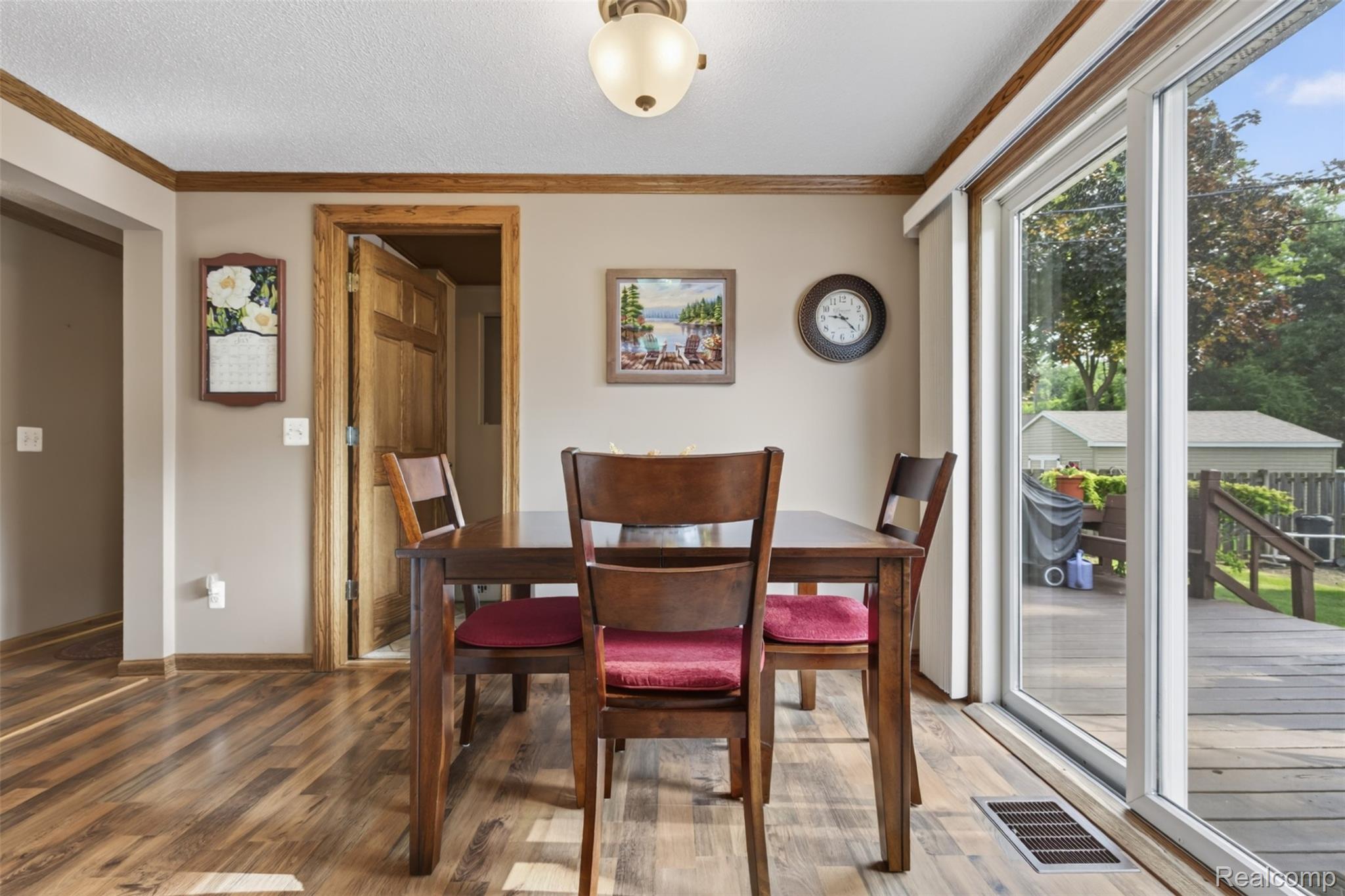 5977 Anglers Road Ortonville, MI 48462 - Photo 8 of 63 Wood-finish flooring extending throughout the space