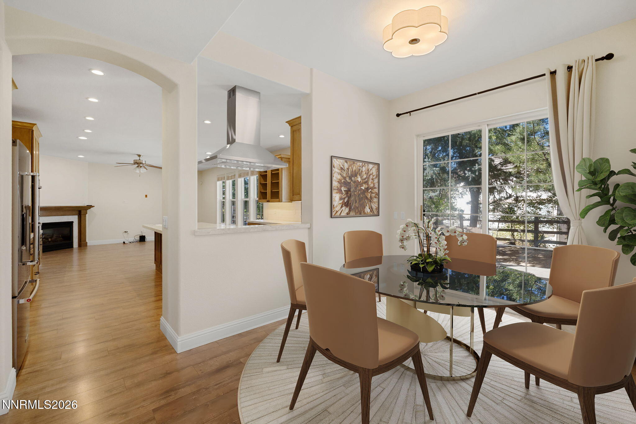 4885 Buckhaven Road Reno, NV 89519 - Photo 16 of 58 a dining room with furniture and wooden floor