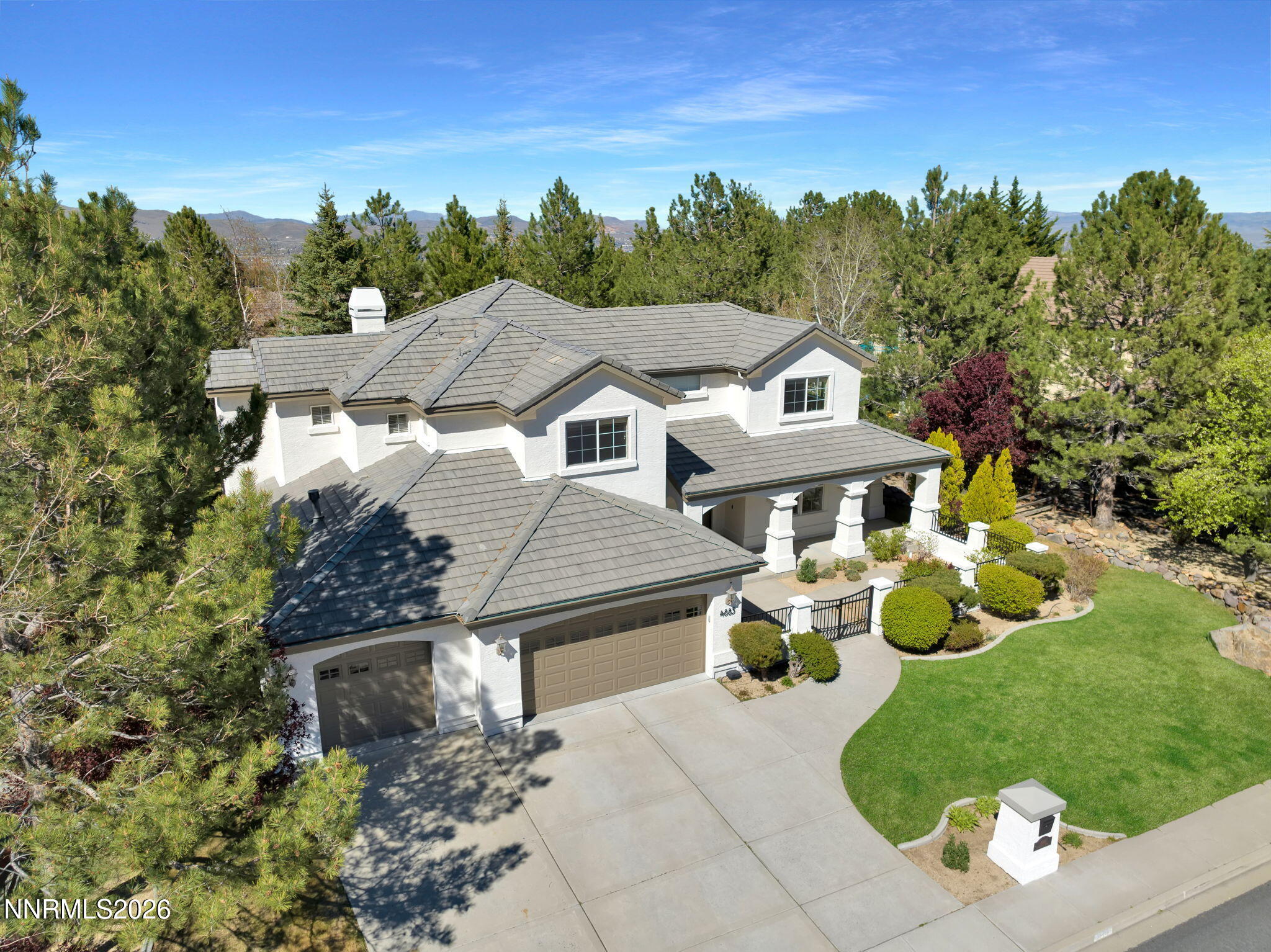 4885 Buckhaven Road Reno, NV 89519 - Photo 2 of 58 an aerial view of a house with garden space and street view