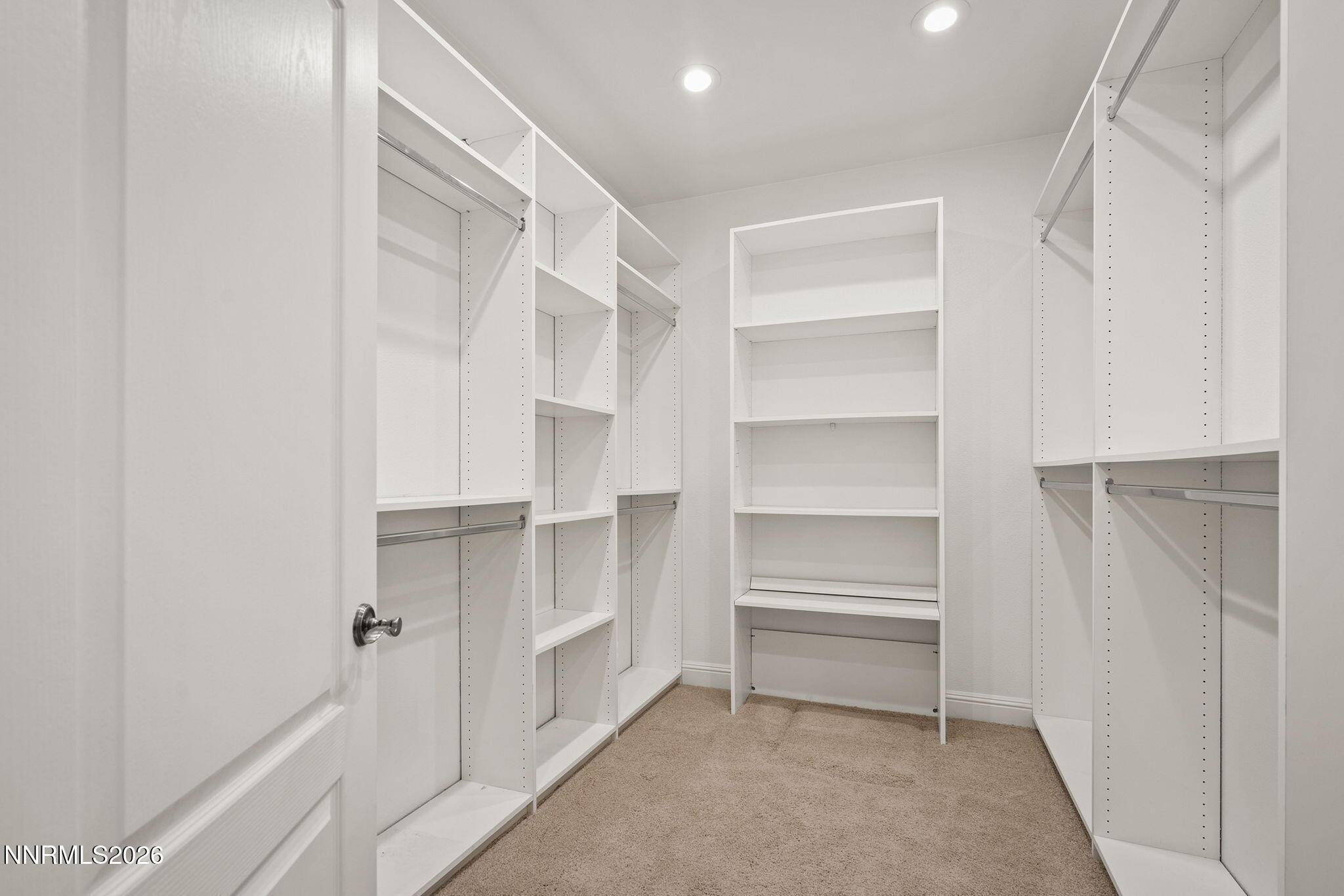 4885 Buckhaven Road Reno, NV 89519 - Photo 32 of 58 a view of walk in closet with empty racks