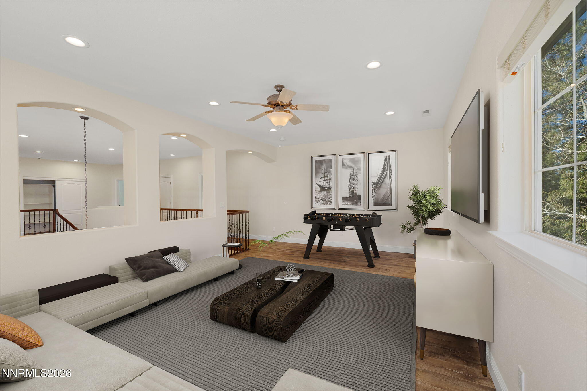 4885 Buckhaven Road Reno, NV 89519 - Photo 37 of 58 a living room with furniture and a large window