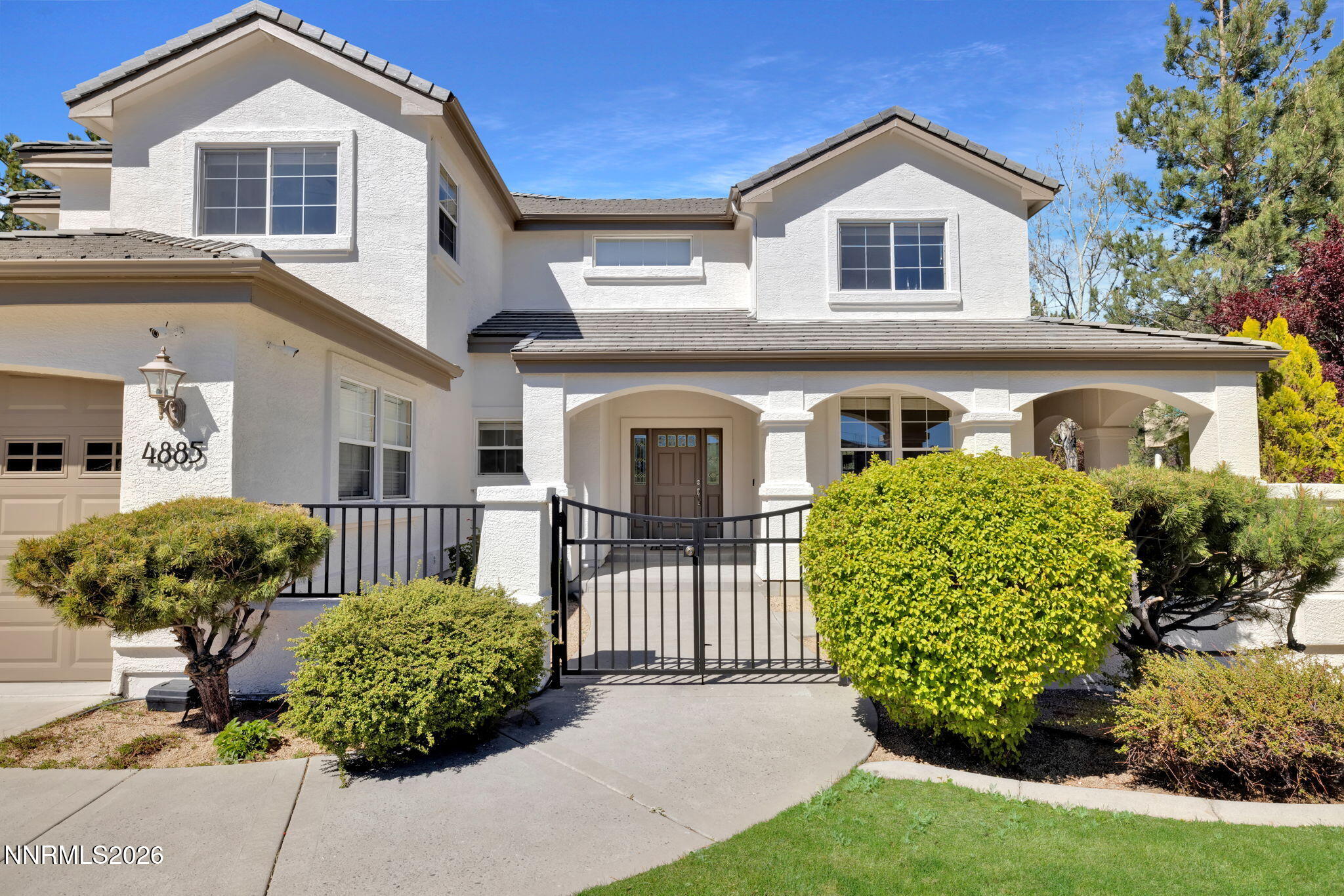 4885 Buckhaven Road Reno, NV 89519 - Photo 4 of 58 front view of a house