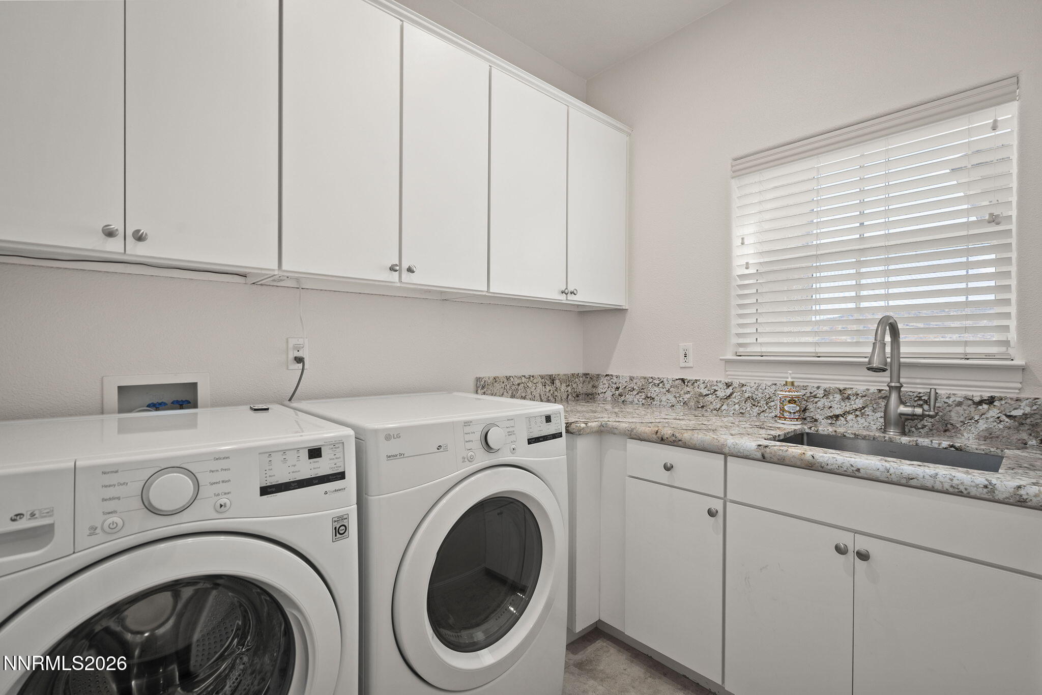 4885 Buckhaven Road Reno, NV 89519 - Photo 44 of 58 a utility room with dryer and washer
