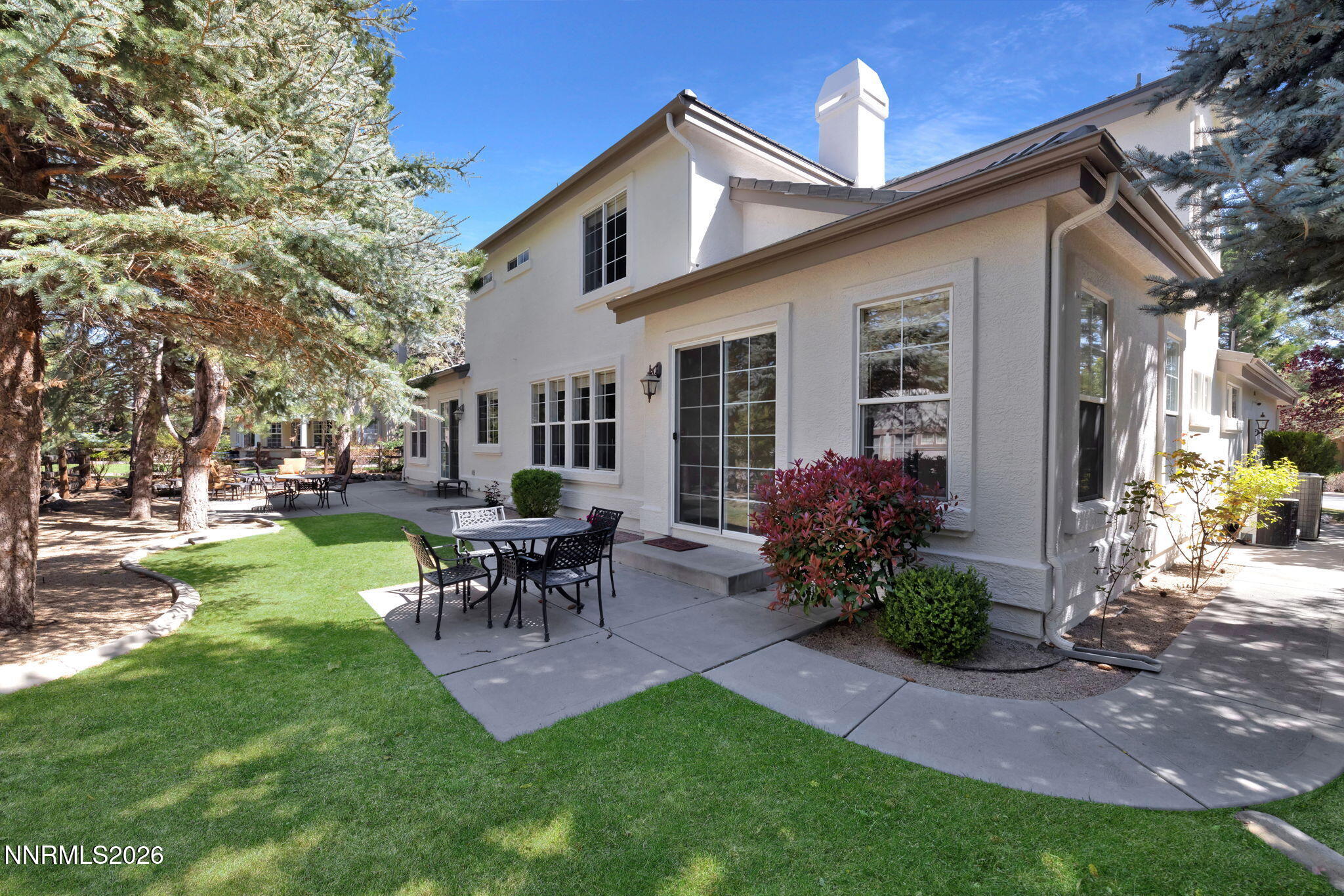 4885 Buckhaven Road Reno, NV 89519 - Photo 46 of 58 a view of a house with backyard and a garden