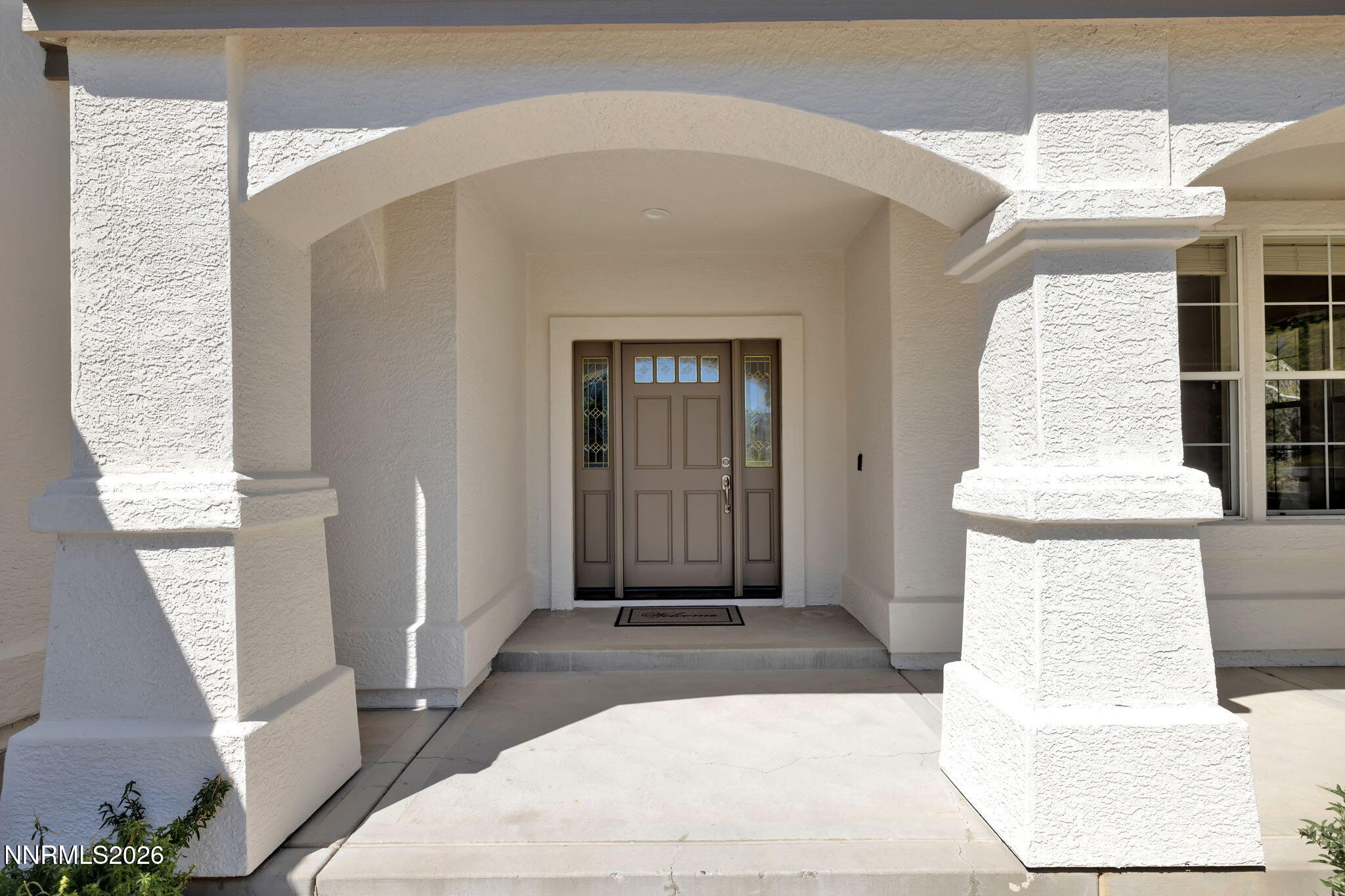 4885 Buckhaven Road Reno, NV 89519 - Photo 5 of 58 a front view of a house with a garage
