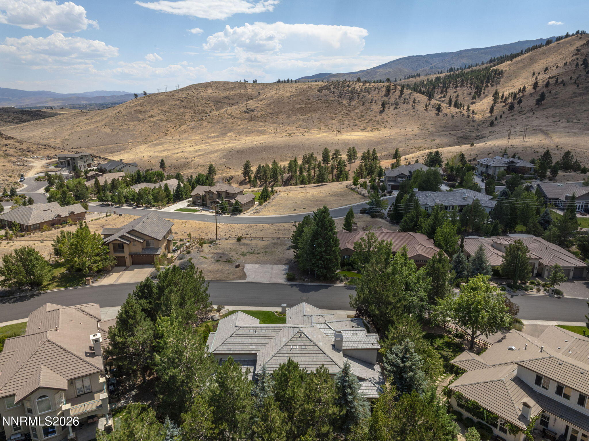 4885 Buckhaven Road Reno, NV 89519 - Photo 53 of 58 an aerial view of residential houses with outdoor space