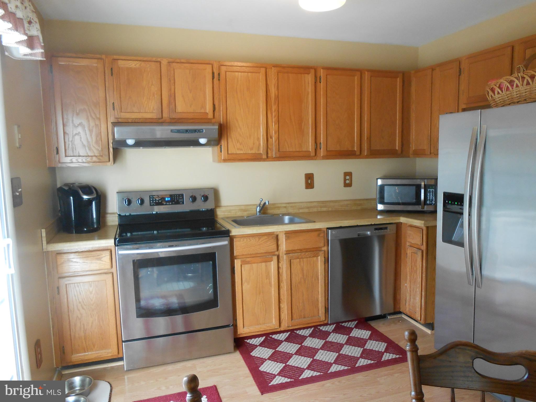 7121 Oliver Beach Road Baltimore, MD 21220 - Photo 19 of 25 REFRIG W/ICE-MAKER, RANGE, DISHWASHER, RANGE HOOD