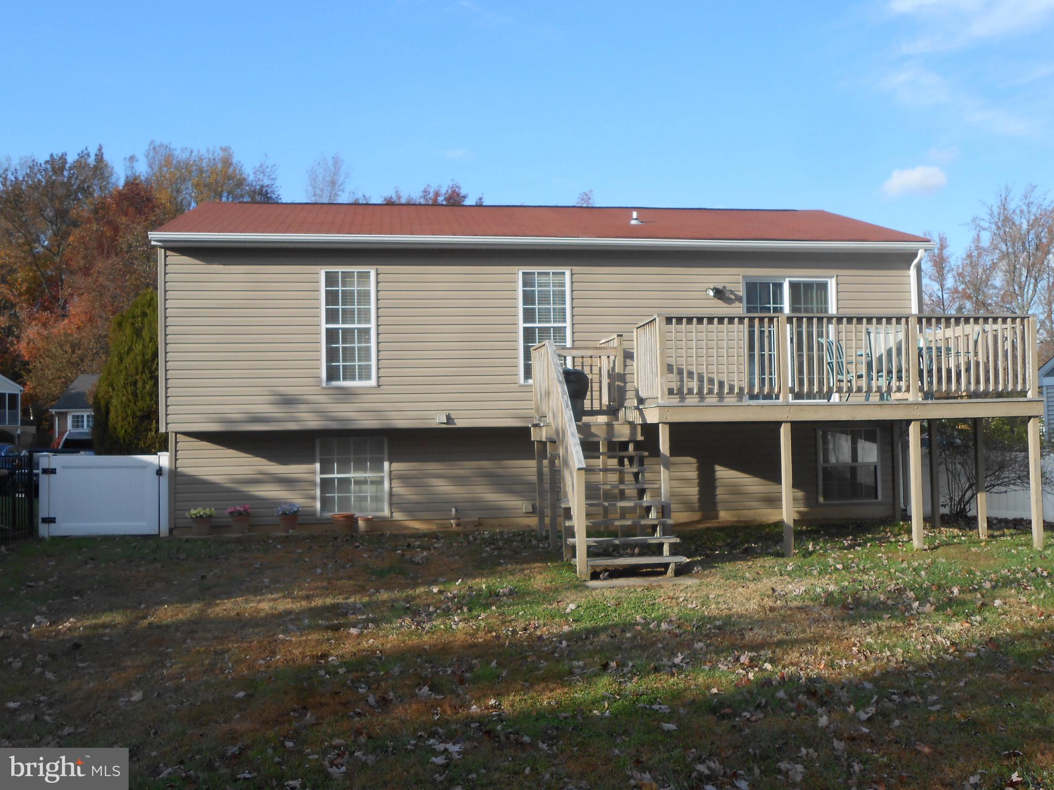 7121 Oliver Beach Road Baltimore, MD 21220 - Photo 3 of 25 16X12 DECK OFF OF KITCHEN