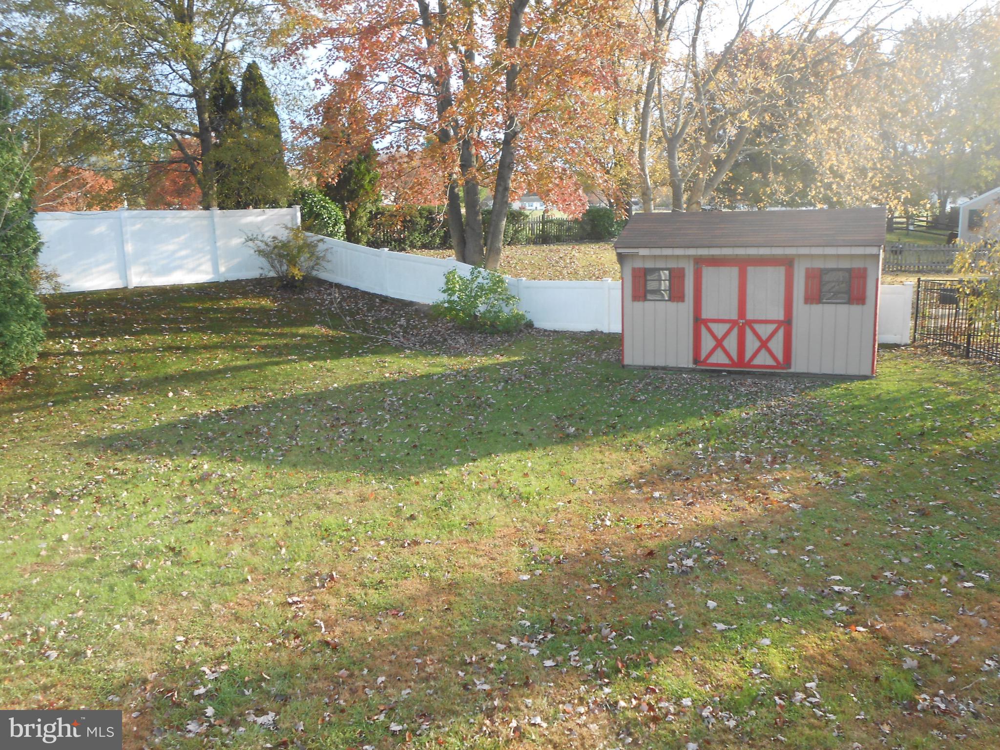 7121 Oliver Beach Road Baltimore, MD 21220 - Photo 6 of 25 FENCED BACK YARD WITH SHED