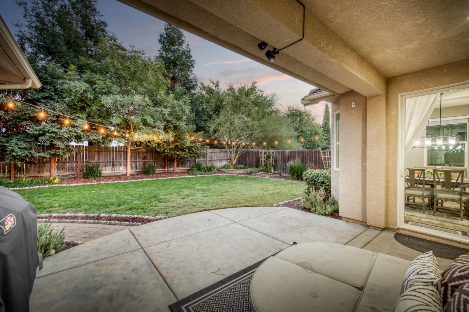 3334 Bellaire Avenue Clovis, CA 93619 - Photo 11 of 54 a view of a house with a backyard