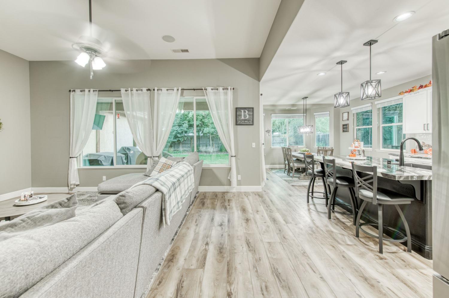3334 Bellaire Avenue Clovis, CA 93619 - Photo 13 of 54 a living room with furniture and a large window