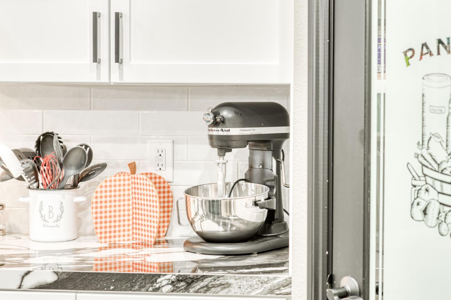 3334 Bellaire Avenue Clovis, CA 93619 - Photo 16 of 54 a kitchen with a sink and a stove