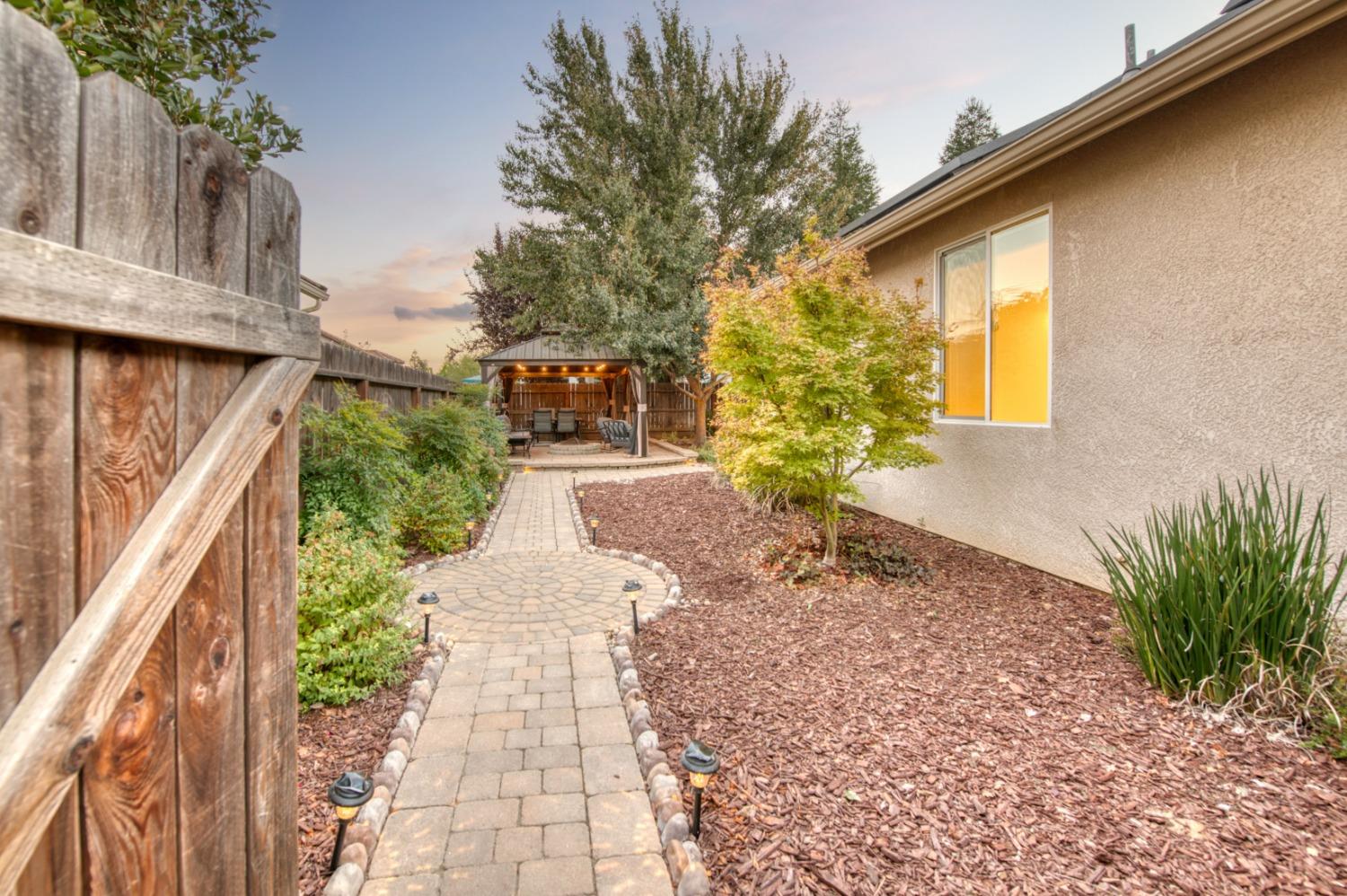 3334 Bellaire Avenue Clovis, CA 93619 - Photo 4 of 54 a path view of a house with a yard