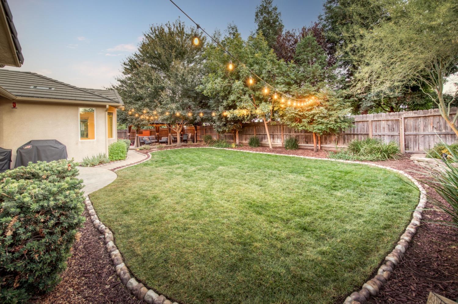 3334 Bellaire Avenue Clovis, CA 93619 - Photo 8 of 54 a house view with a garden space