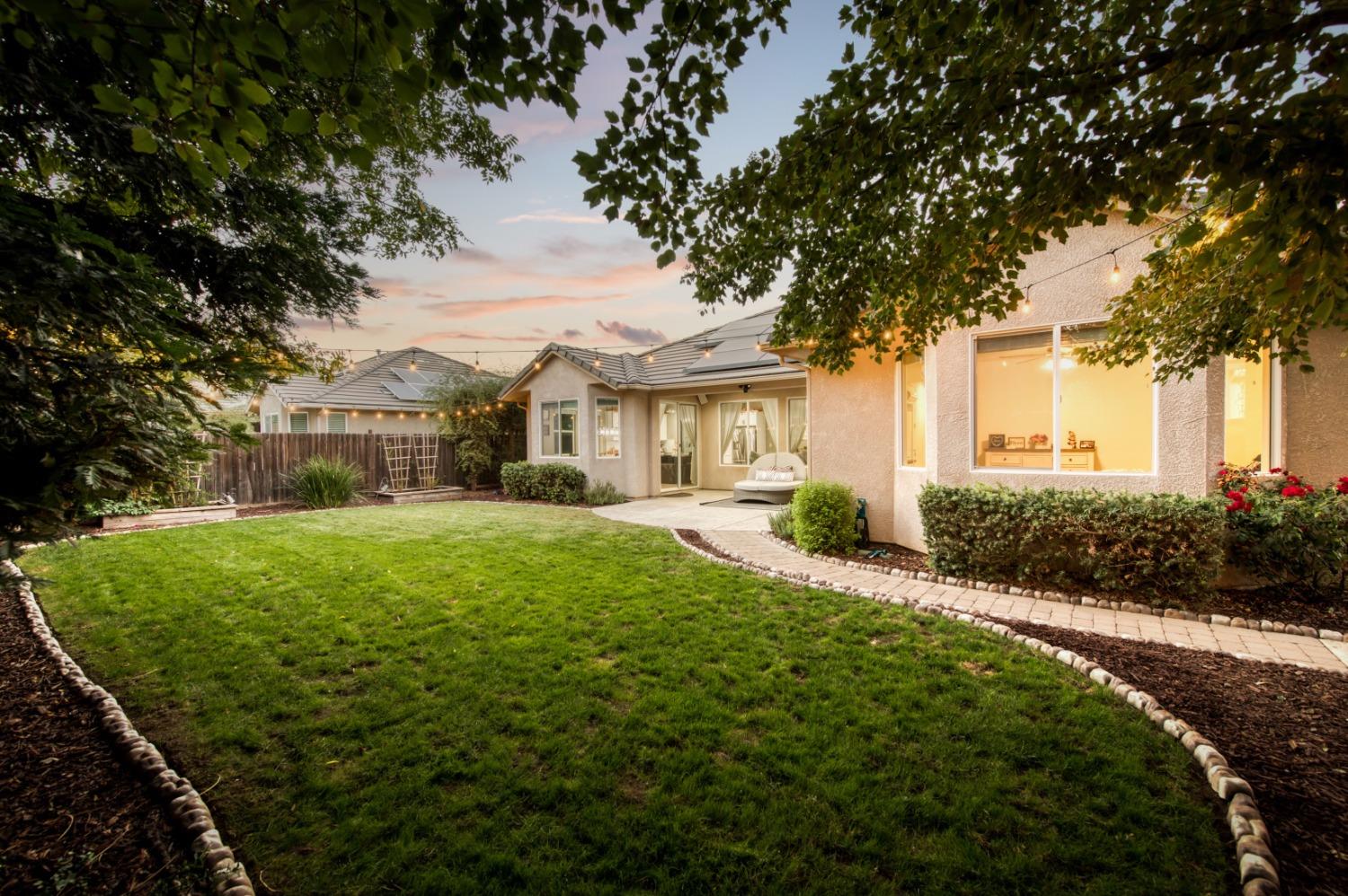 3334 Bellaire Avenue Clovis, CA 93619 - Photo 9 of 54 a front view of a house with garden