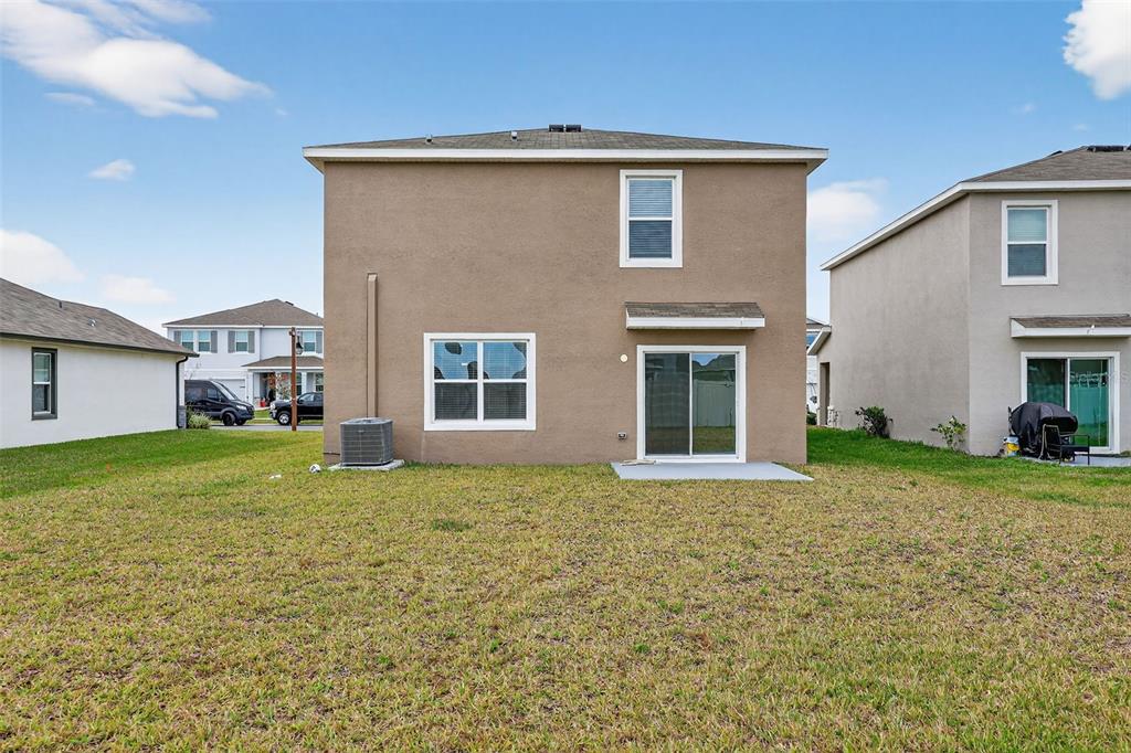3842 Sunny Spring Street Plant City, FL 33565 - Photo 27 of 46 a house view with a garden space