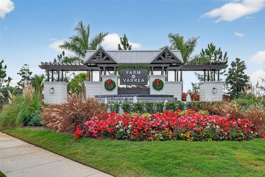3842 Sunny Spring Street Plant City, FL 33565 - Photo 29 of 46 a view of a house with a yard and sitting area
