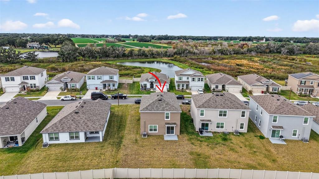 3842 Sunny Spring Street Plant City, FL 33565 - Photo 34 of 46 a view of houses with outdoor space and ocean view