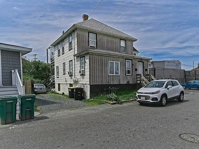 a car parked in front of a house