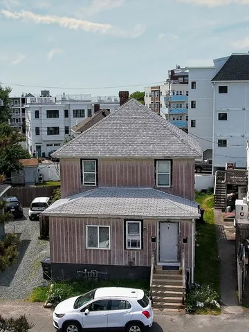 a car parked in front of a building