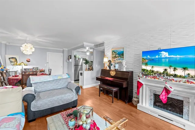 a very nice looking living room with a large window