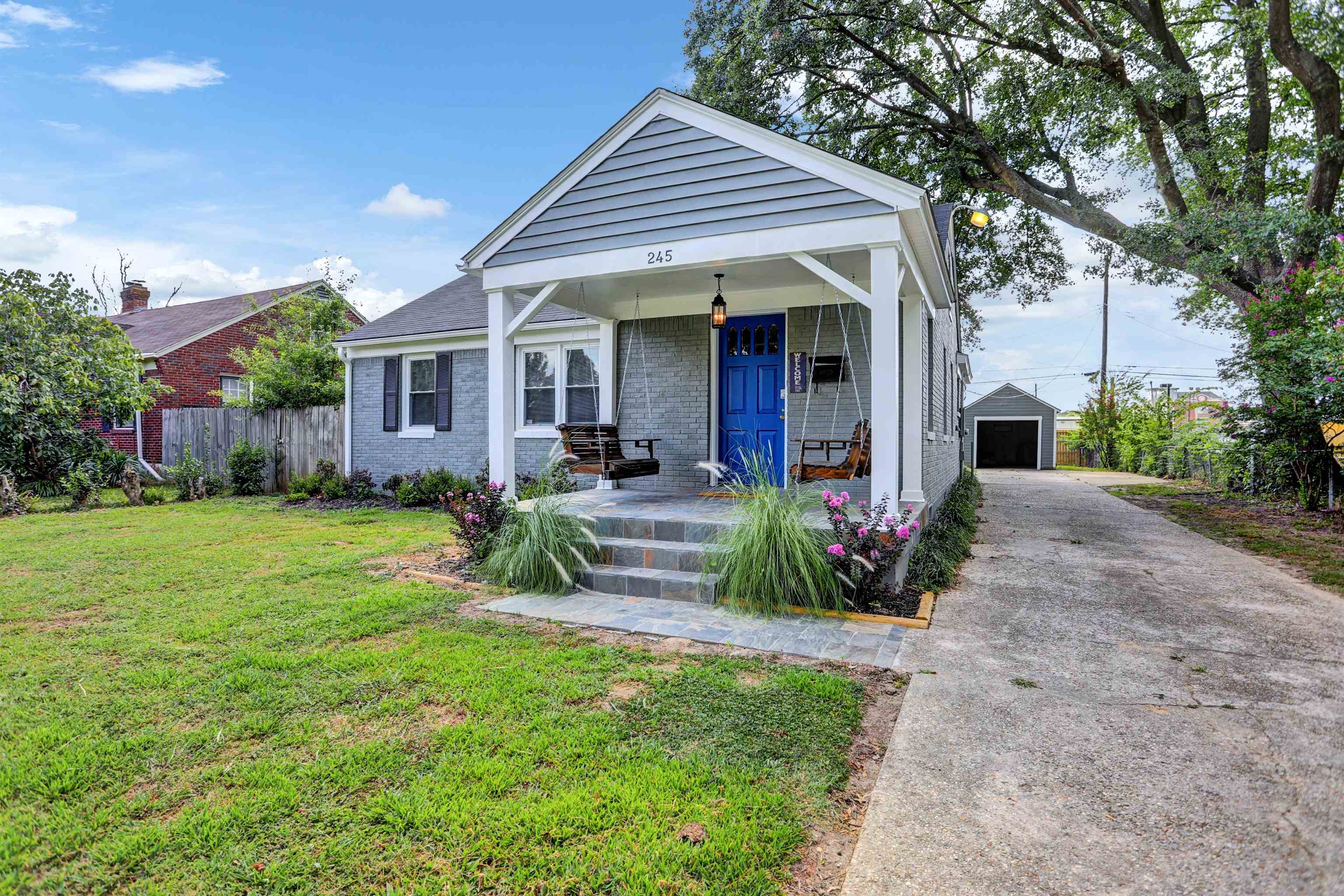 245 West Edwin Circle Memphis, TN 38104 - Photo 24 of 39 a view of a house with a yard and potted plants
