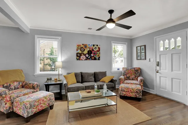 a living room with furniture and a window