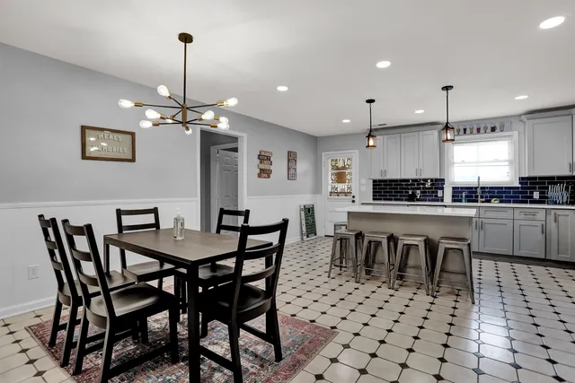 a view of a dining room and chandelier