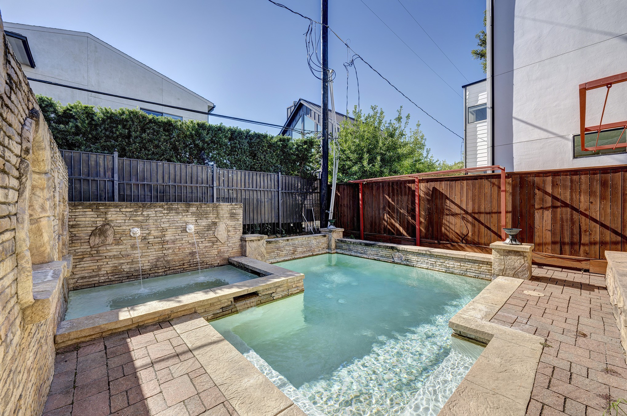 1919 West McKinney Street Houston, TX 77019 - Photo 1 of 31 a view of a backyard with sitting area and furniture