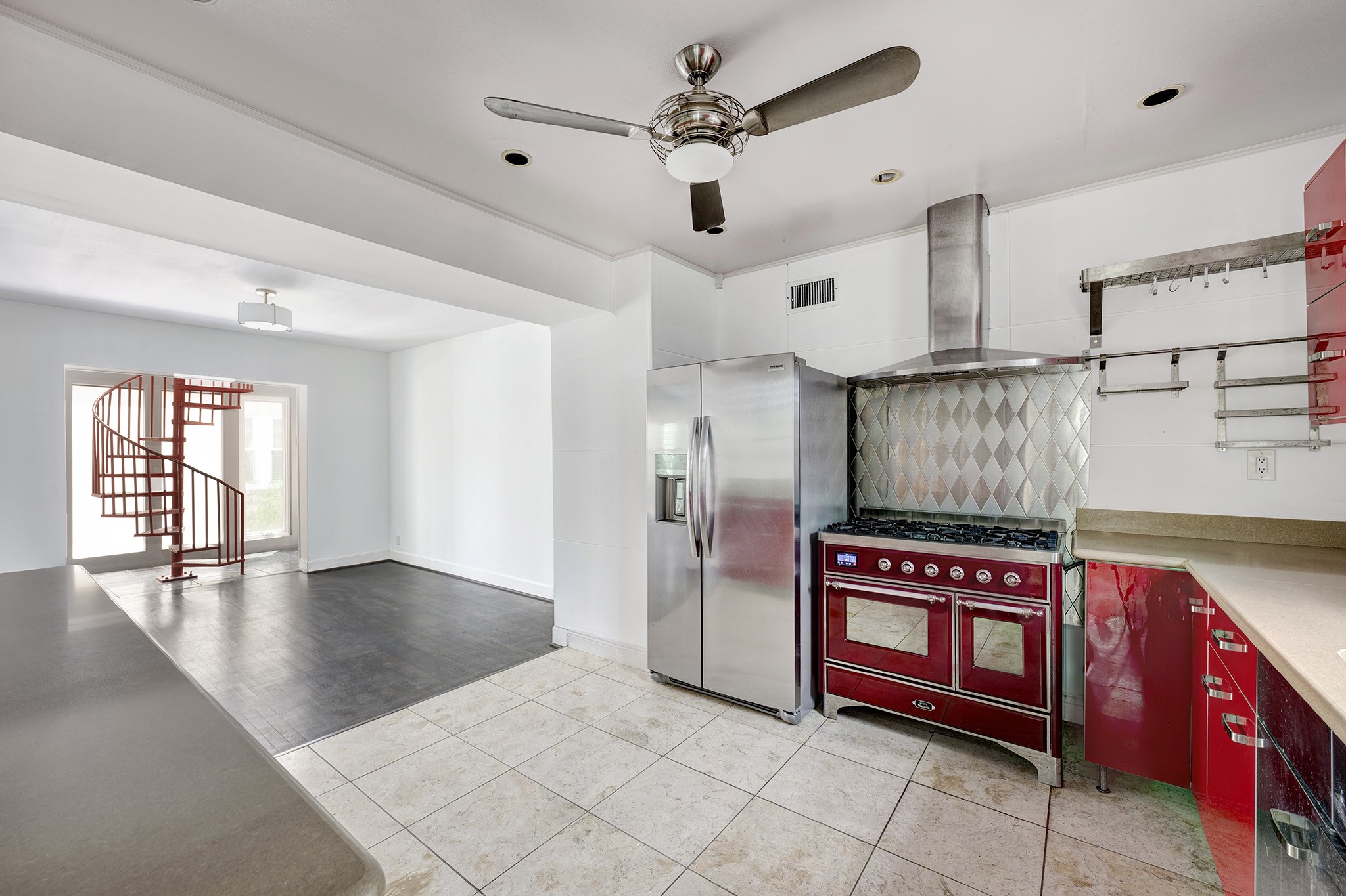 1919 West McKinney Street Houston, TX 77019 - Photo 9 of 31 a view of a hallway with entryway and a chandelier