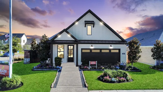 a view of a hallway with wooden floor and furniture